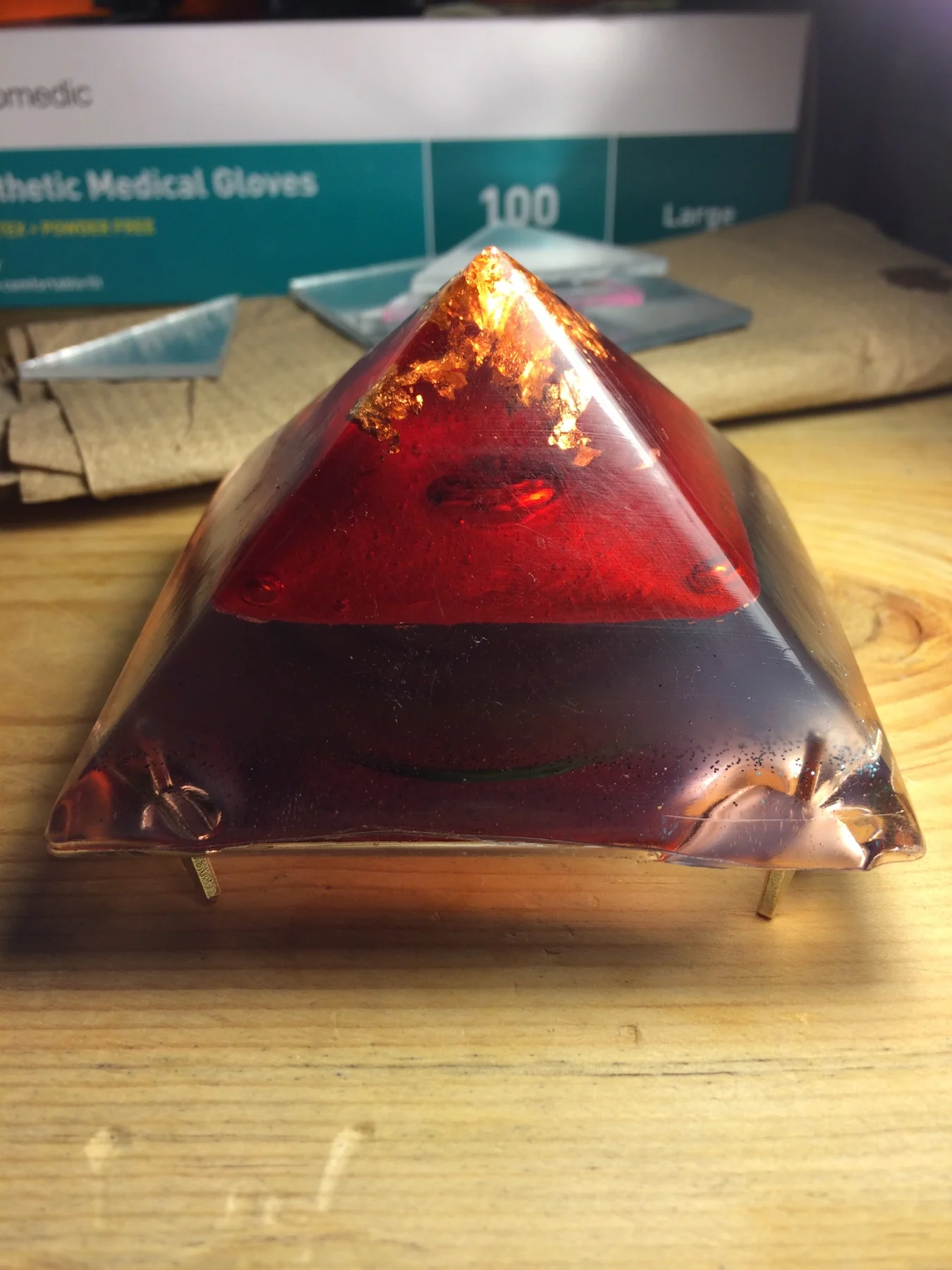 Red illuminated resin pyramid