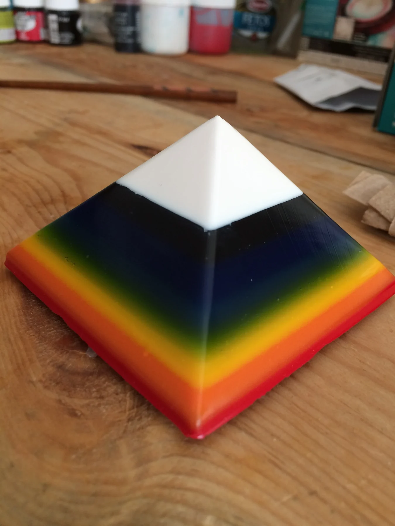 Layered rainbow resin pyramid