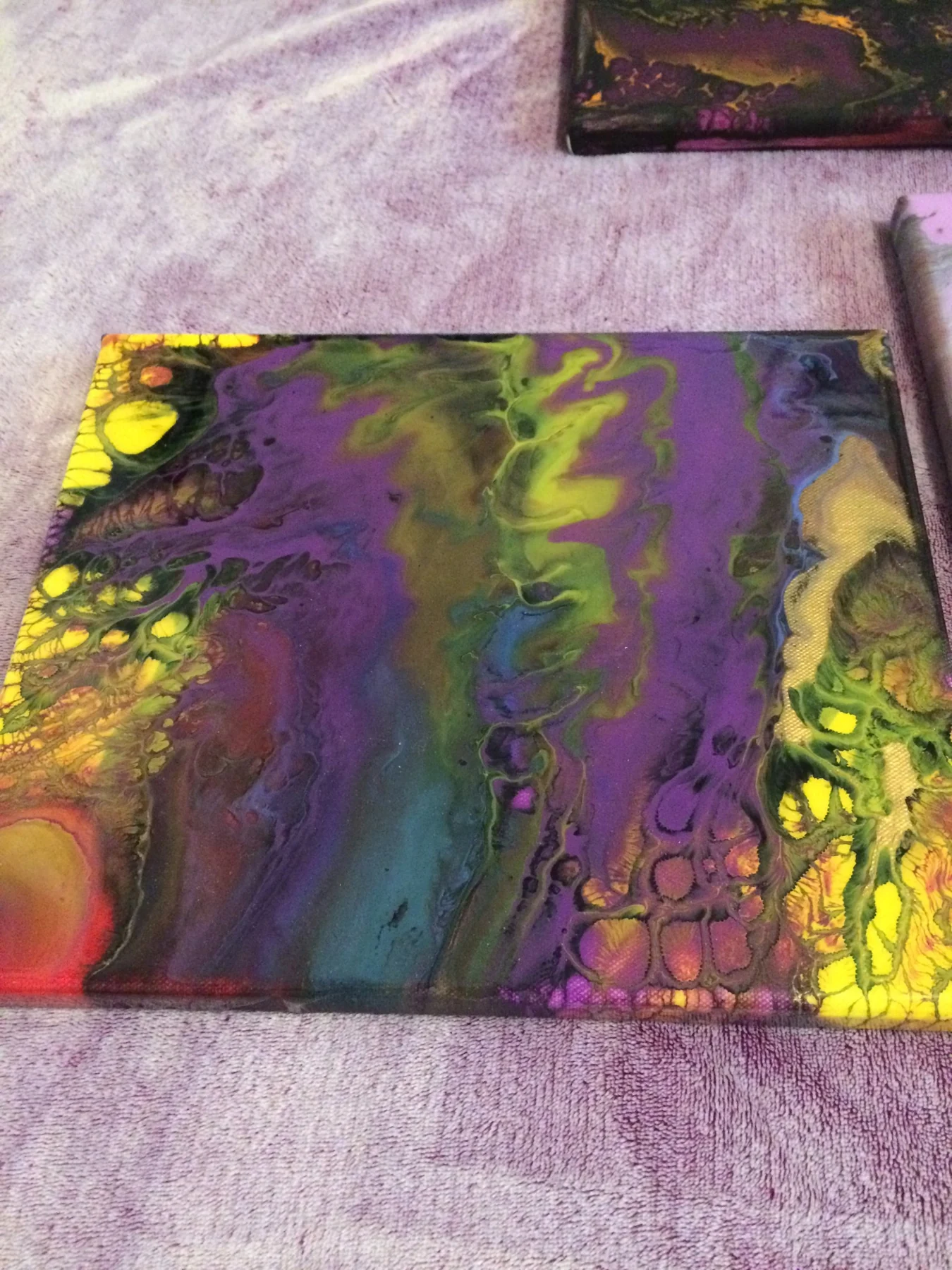 Purple, green and yellow fluid painting
