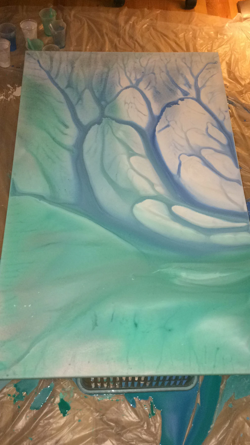 Pale turquoise and blue branching abstract painting