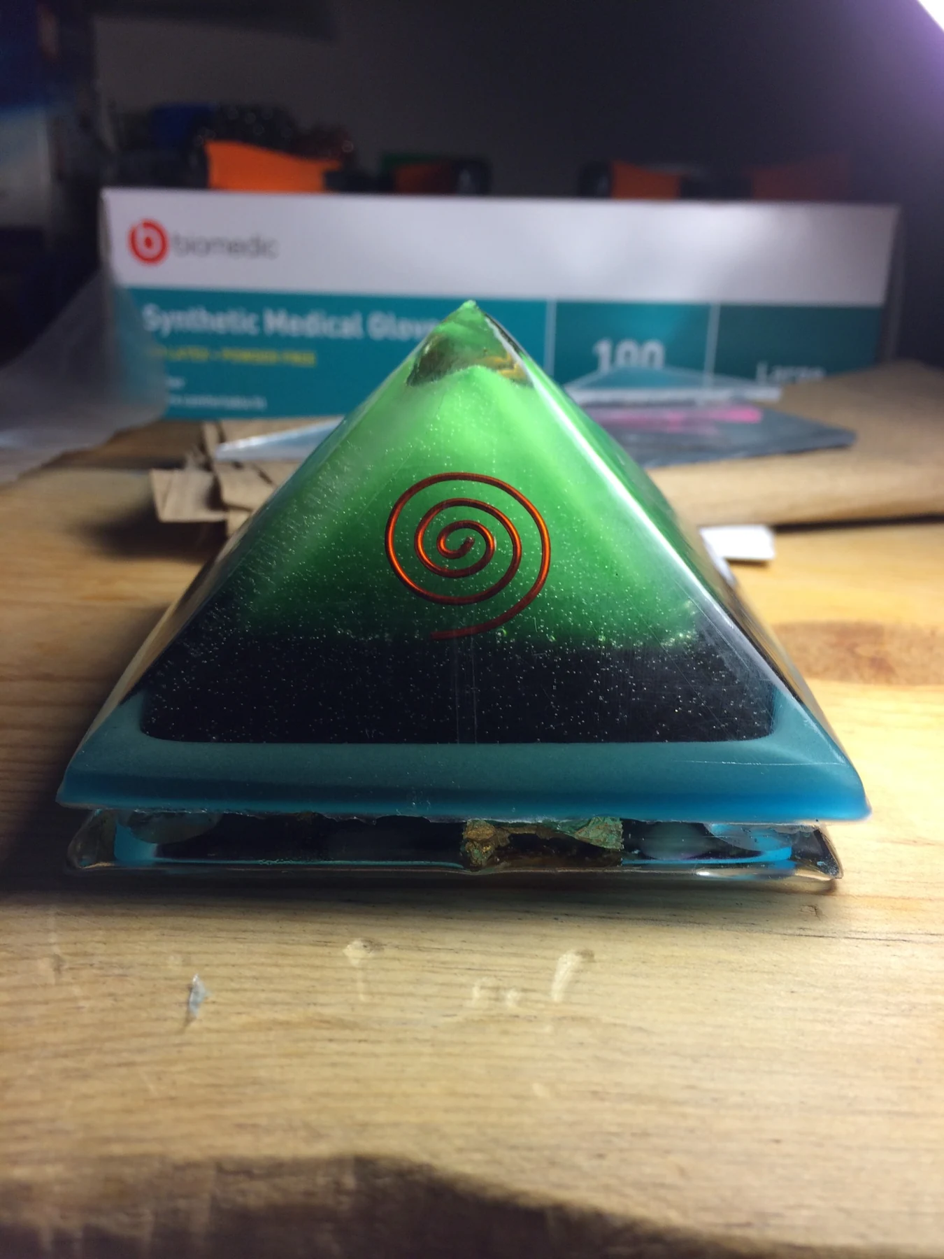 Green resin pyramid with embedded spiral