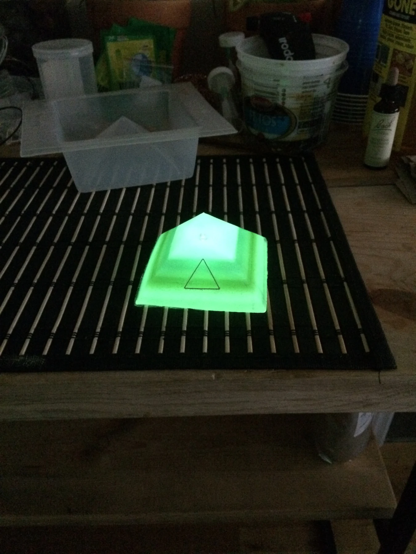 Green illuminated resin pyramid